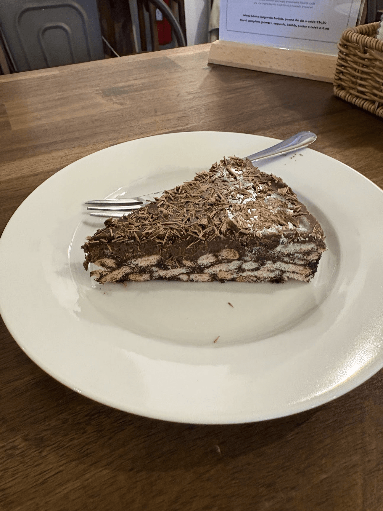 Chocolate cake served with elegant garnish